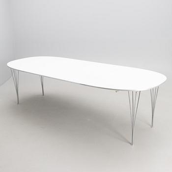 BRUNO MATHSSON AND PIET HEIN, a 'Superellips' dining table from Fritz Hansen, 1993.