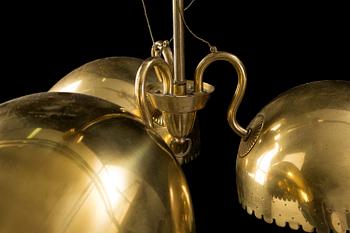 A Carl-Axel Acking Swedish Modern brass ceiling light, 1940's.