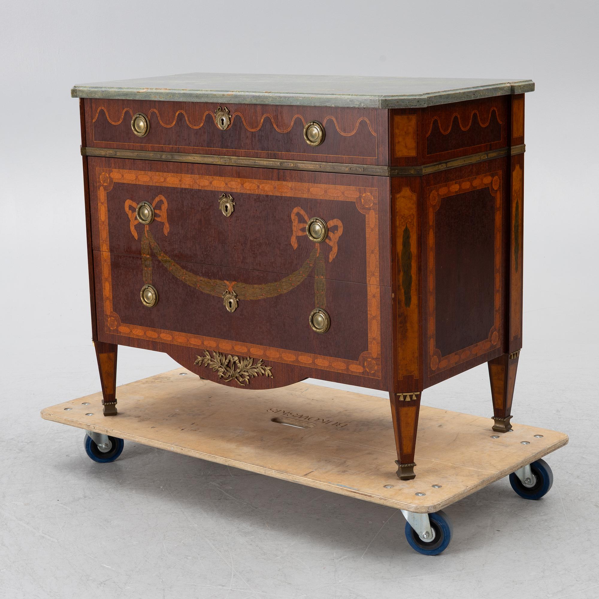 A Gustavian style chest of drawers, 20th century.