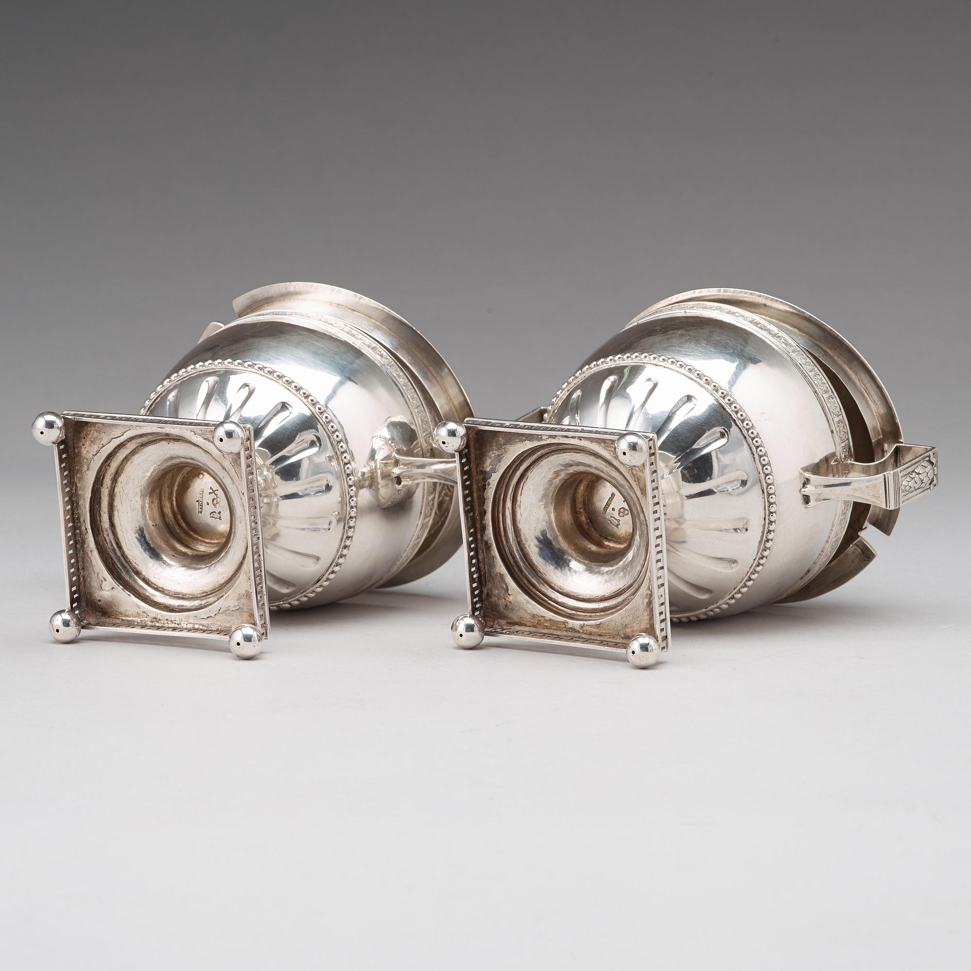 A pair of Swedish late 18th century silver sugar bowls and covers, mark of Pehr Zethelius, Stockholm 1780 and 1781.