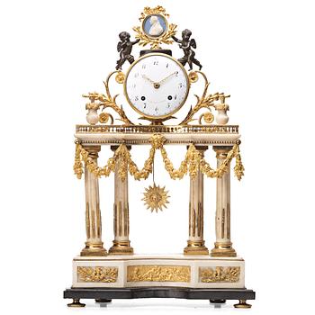 177. A Louis XVI late 18th century mantel clock.