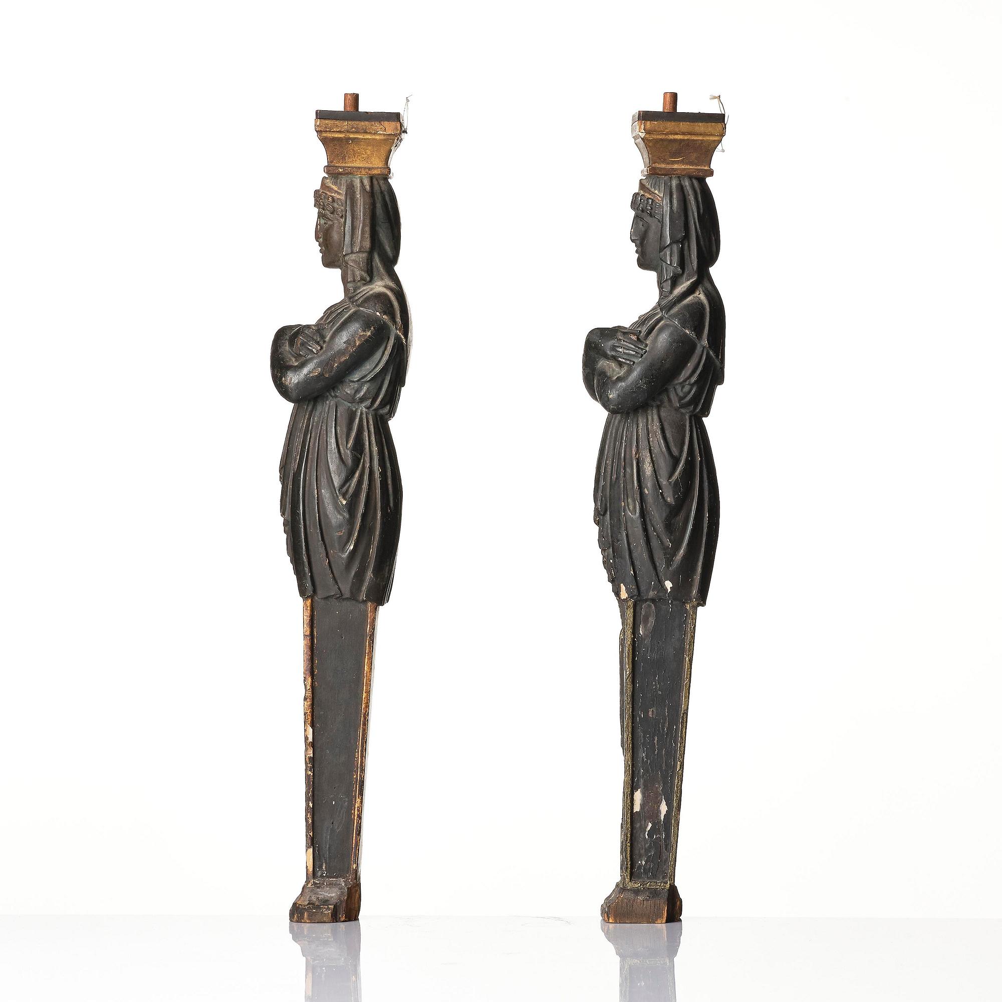 A pair of late Gustavian carved caryatids in the manner of Pehr Ljung (1743-1819) and Ernst Philip Thomann (1760-1833).