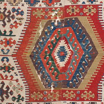 An antique Anatolian kilim, ca 324 x 169 cm.