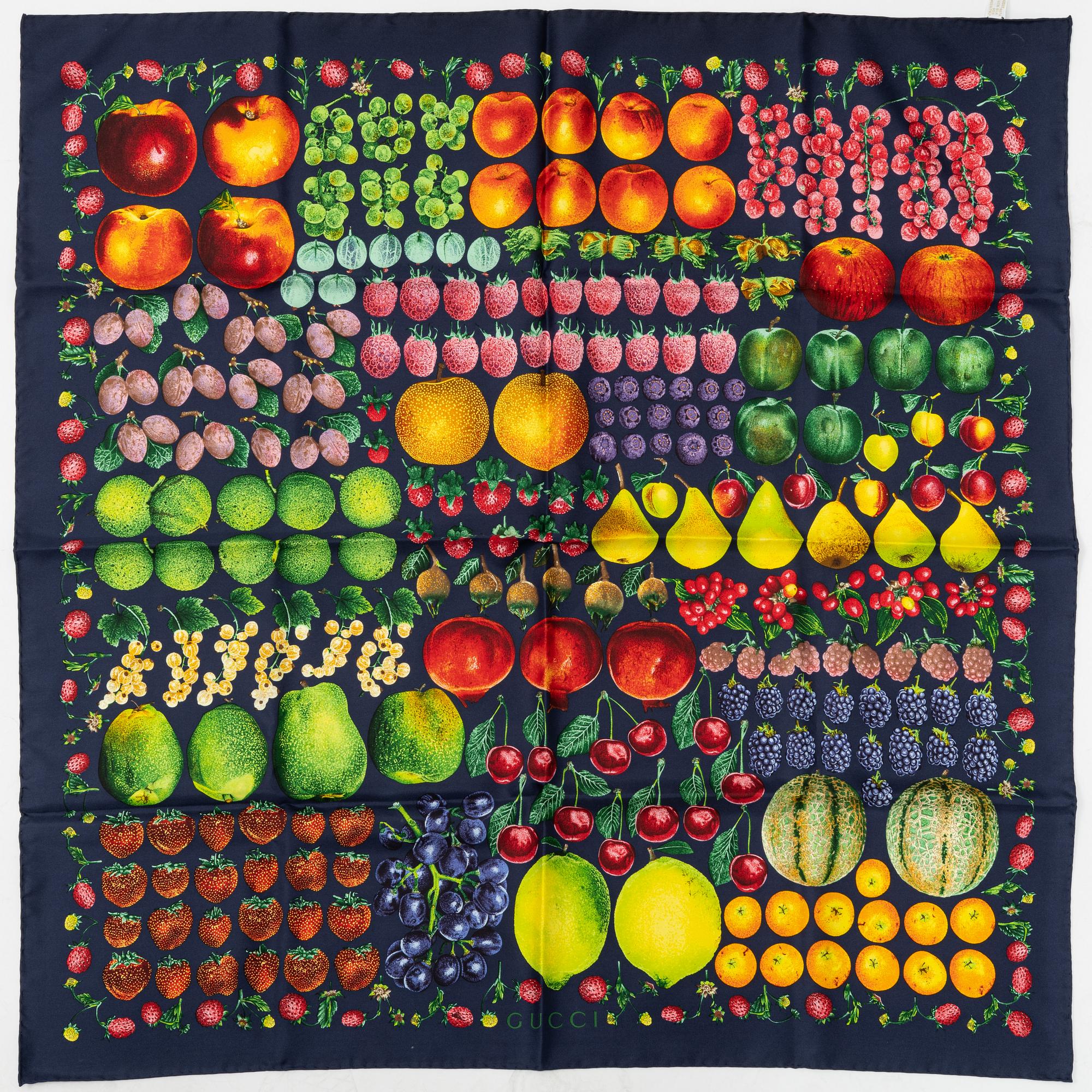 Gucci, a silk scarf.