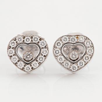 1137. A pair of Chopard "Happy Diamonds" earrings in 18K gold set with round brilliant-cut diamonds.