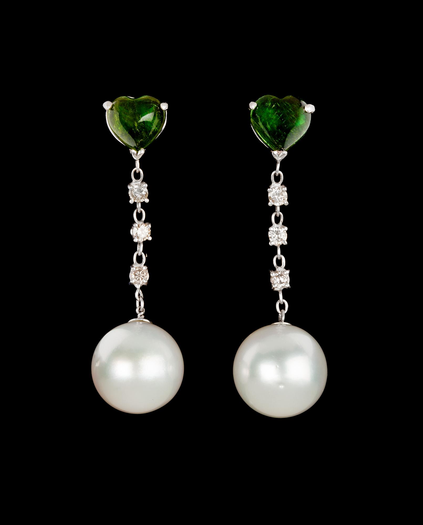 A pair of cultured South sea pearl, heart cut tourmaline and diamond earrings.