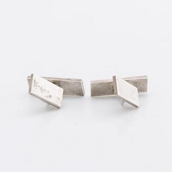 A Swedish 20th century pair of strling cuff links mark of Wiwen Nilsson Lund 1951, weight ca 12,4 gr, length ca 2,2 cm.