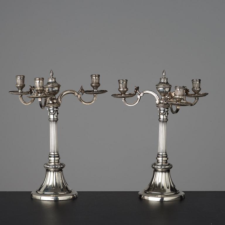 A pair of Gustavian three-light candelabra by Johan Gustaf Ahlgren, Stockholm 1777.