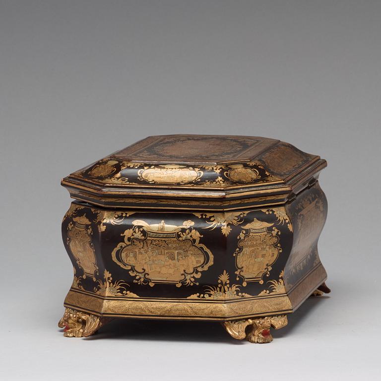 A lacquered tea box with pewter canisters, Qing dynasty, late 19th Century.