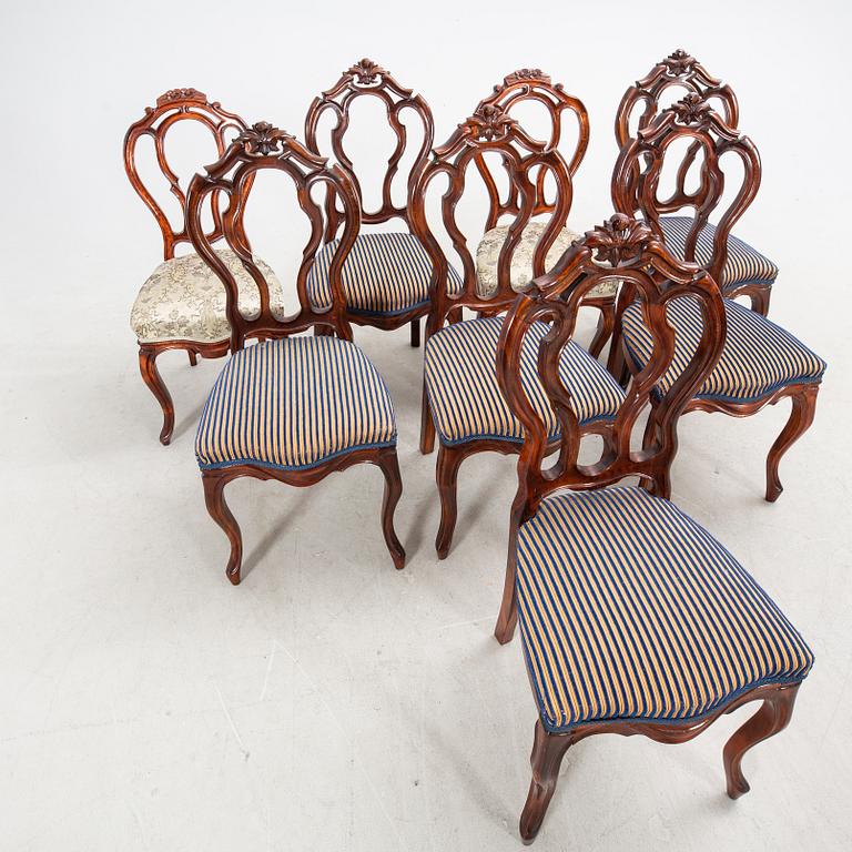 A set of six and two Neo Rococo mahogany chairs.