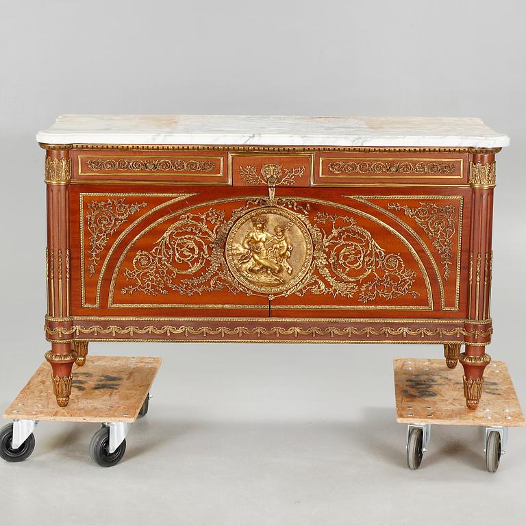 A Louis XVI style chest of drawers, second half of the 20th century.