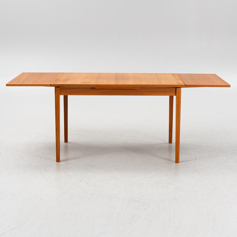 A teak dining table 1960s.