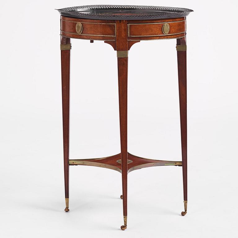 A late Gustavian mahogany, brass-mounted and tôle-peinte tray table by A. Lundelius (master in Stockholm 1778-1823).