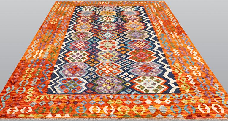 A kilim carpet, ca 290 x 199 cm.