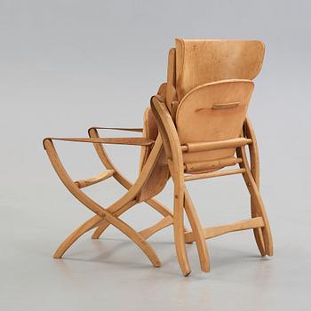 A pair of Poul Hundevad oak Egyptian folding chairs, Vamdrup, Denmark 1950-60's.