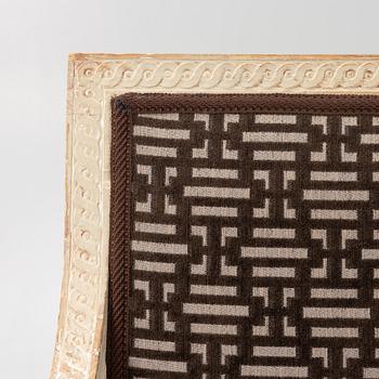 A Gustavian open armchair, Stockholm, late 18th century.