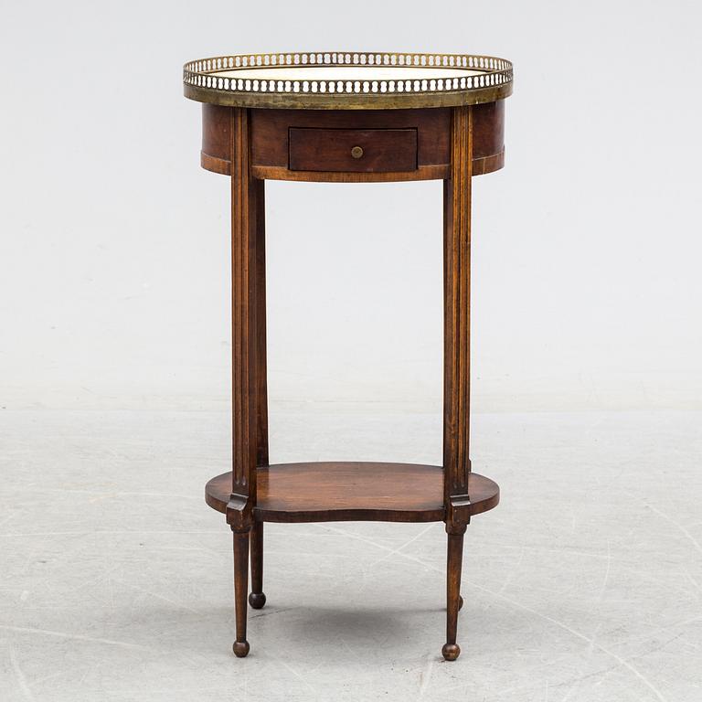 An end of the 19th century late Gustavian style lamp table.