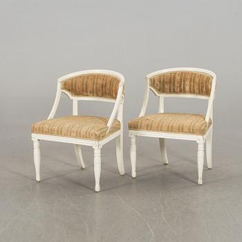 a pair of 19th century armchairs.