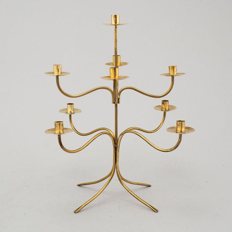 A model 2454 brass candle stick by Josef Frank for Firma Svenskt Tenn.