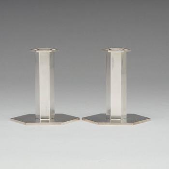 Wiwen Nilsson, a pair of sterling candlesticks, Lund 1964 and 1968.