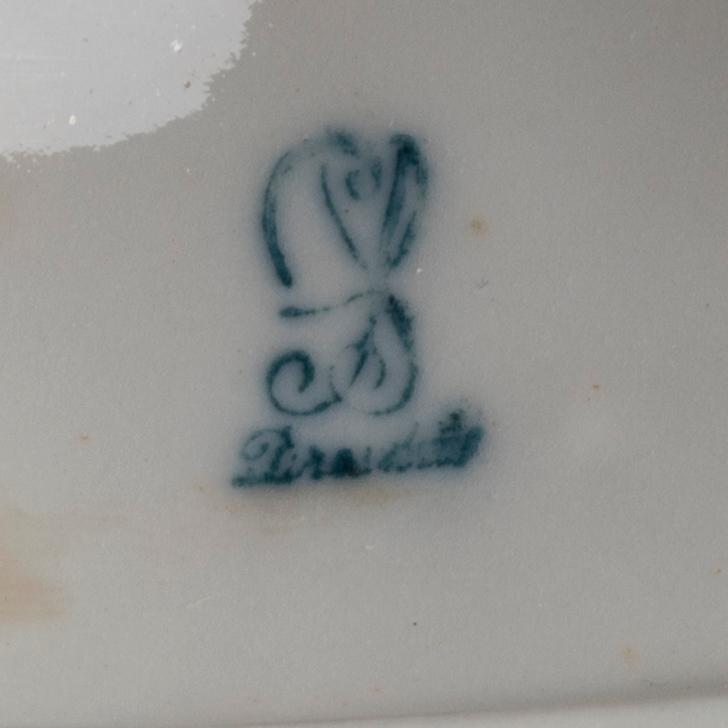 A DRESDEN PORCELAIN FIGURINE.