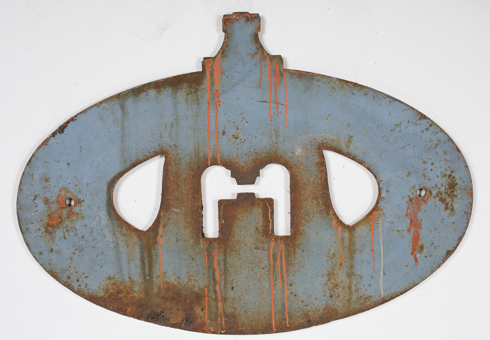 SKYLT, gjutjärn, 1900-talets första hälft.