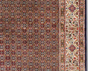 A Moud part silk carpet, signed, 335 x 250 cm.