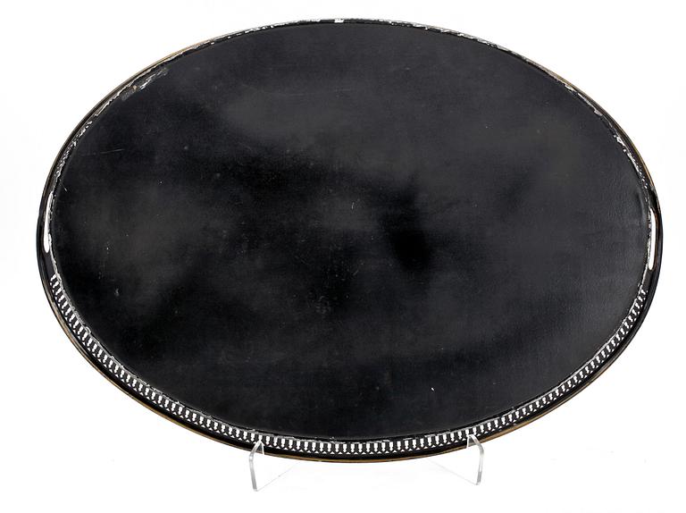 A black 19th Century tin tray.