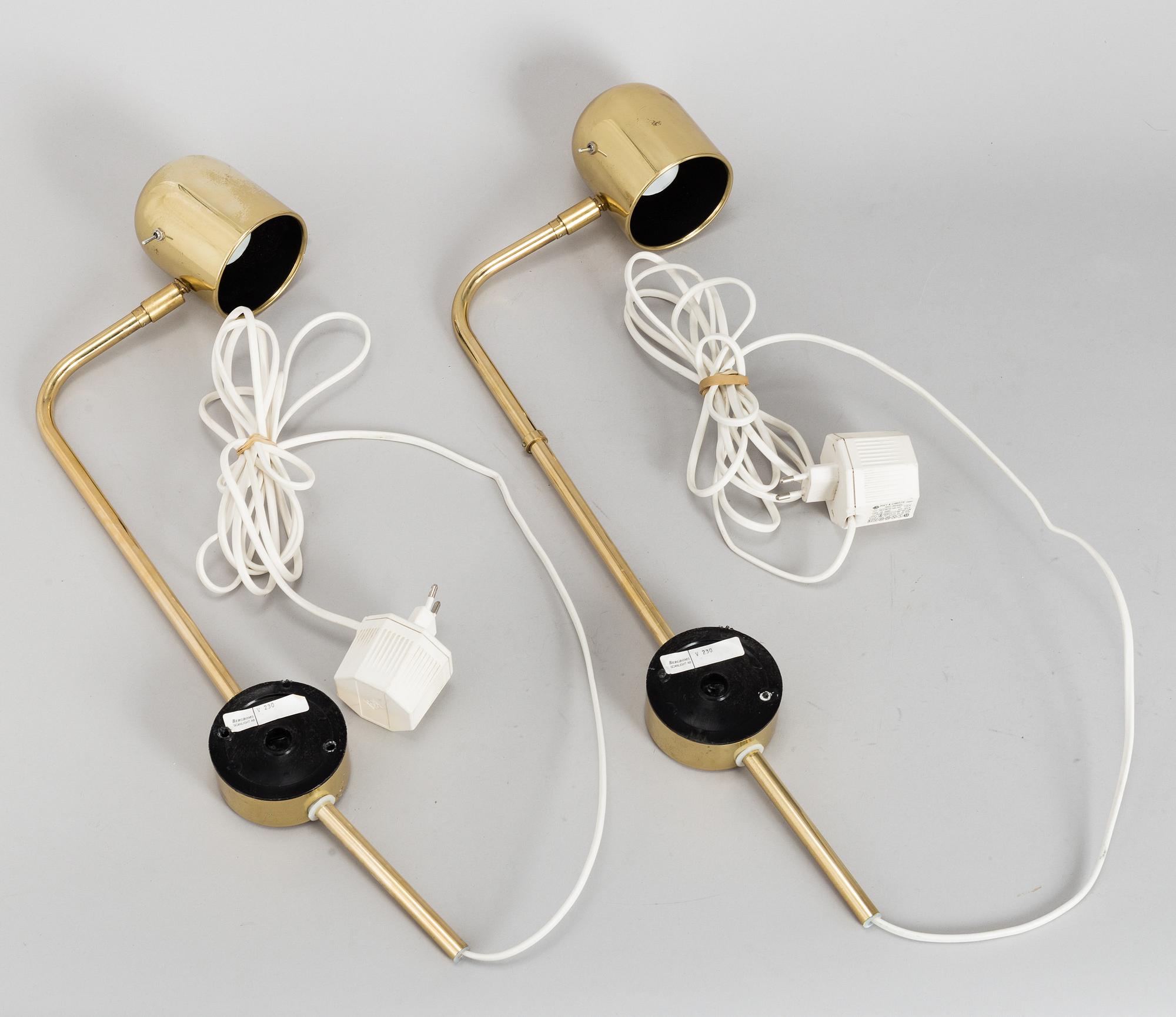 A pair of brass wall lights by Bergboms.