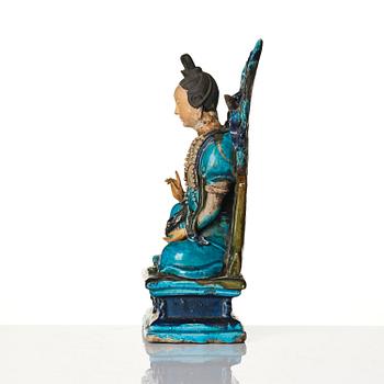 A  turquoise glazed figure of Guanyin, Ming dynasty (1368-1644).