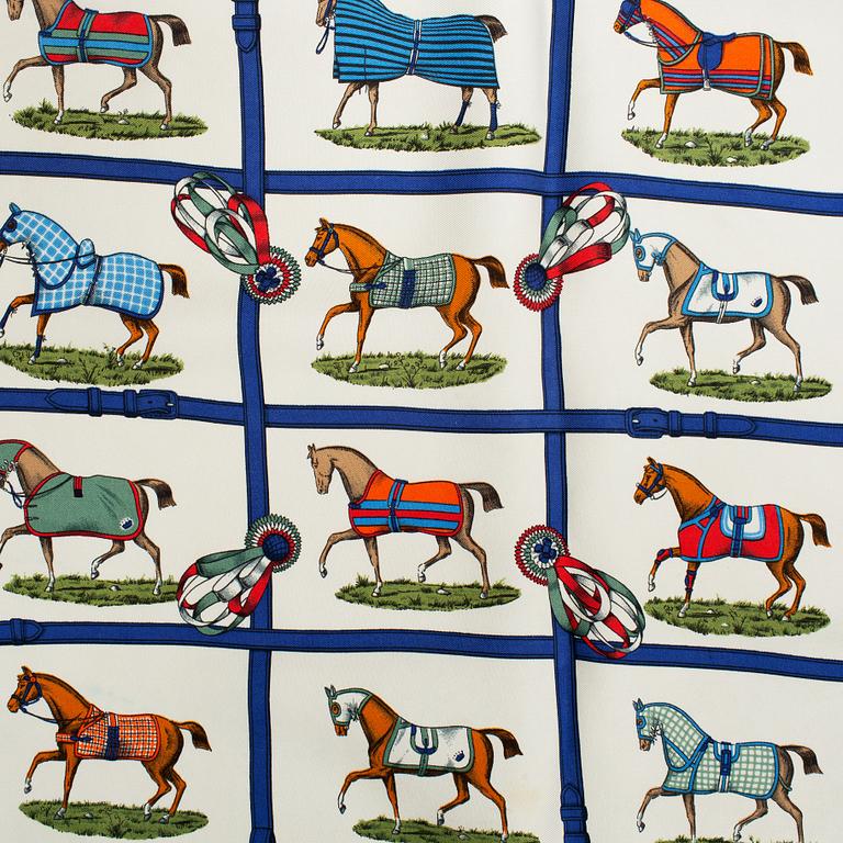 Hermès, a 'Petits Chevaux' silk scarf.