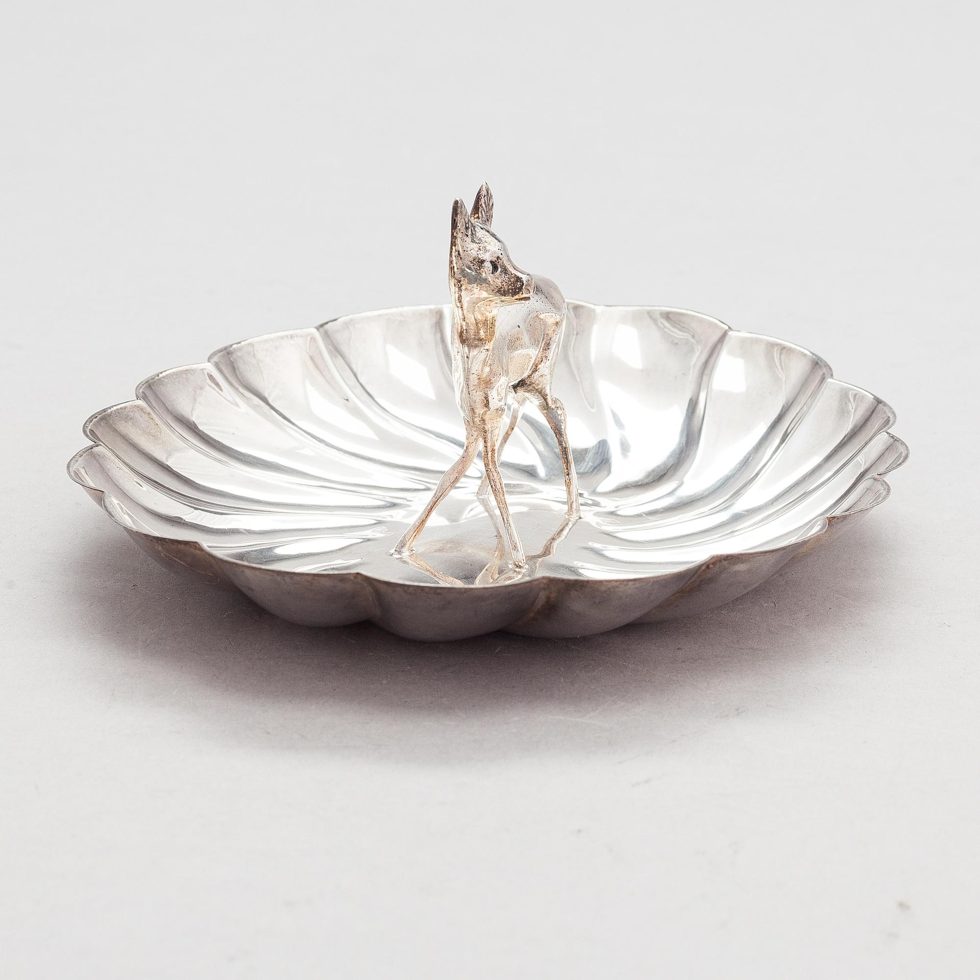 A scalloped silver dish, Pasgorcy, Madrid, Spain, after 1934.