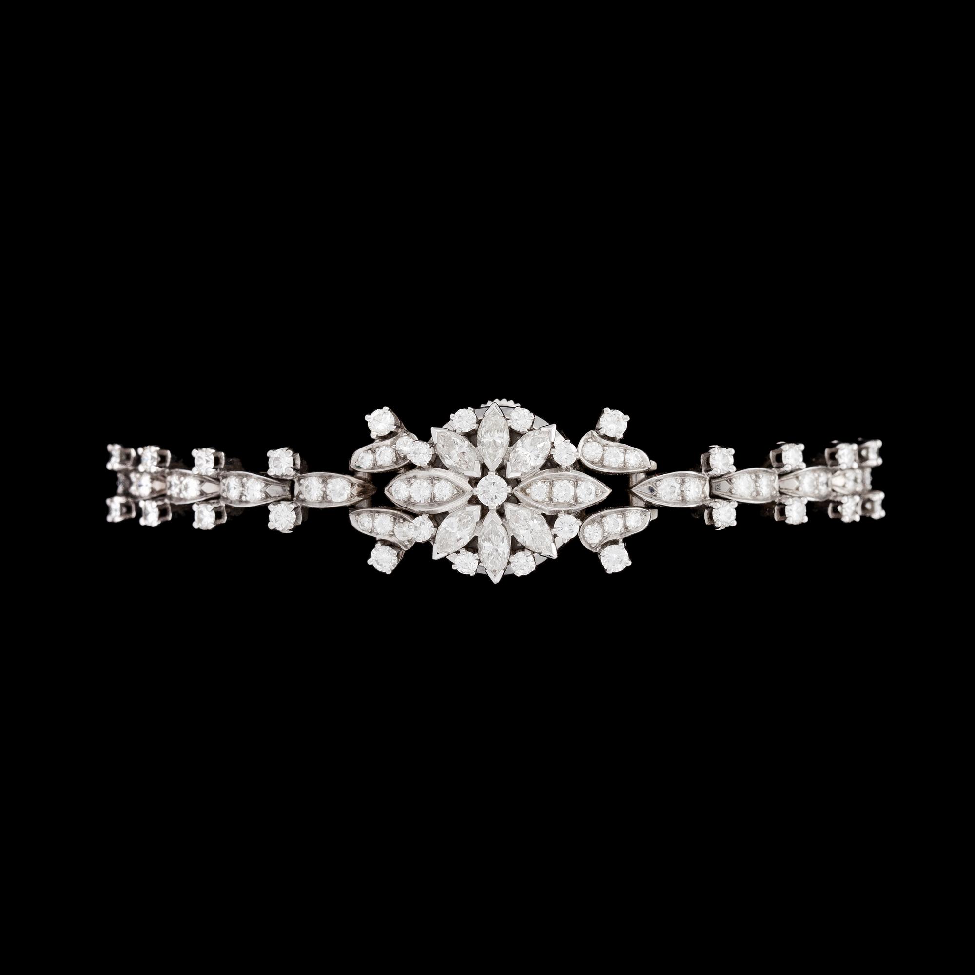 LADIES WRIST WATCH, Gübelin, brilliant and marquise cut diamonds, tot. 3.68 cts, 1960's.
