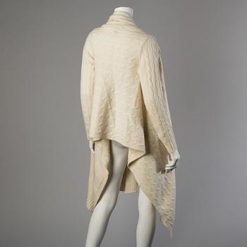 A white wool- and cashmere poncho by Ralph Lauren.