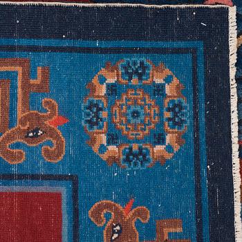 A CARPET, an old Baotou figural, China, ca 162,5 x 233,5 cm.