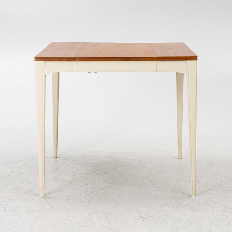 A dining table, mid-20th century.