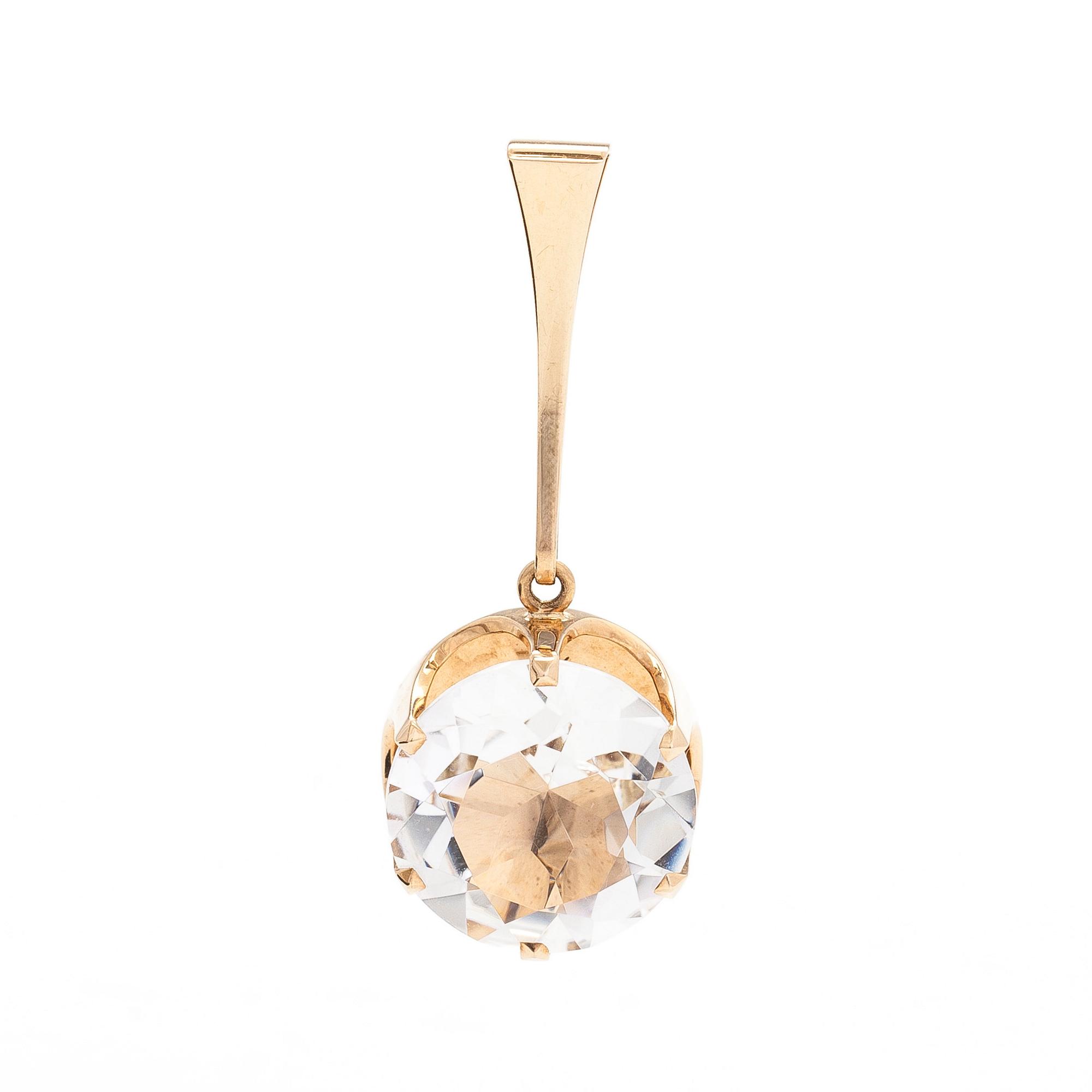 Elis Kauppi, A 14K gold pendant with a rock crystal. Kupittaan kulta, Turku 1966.