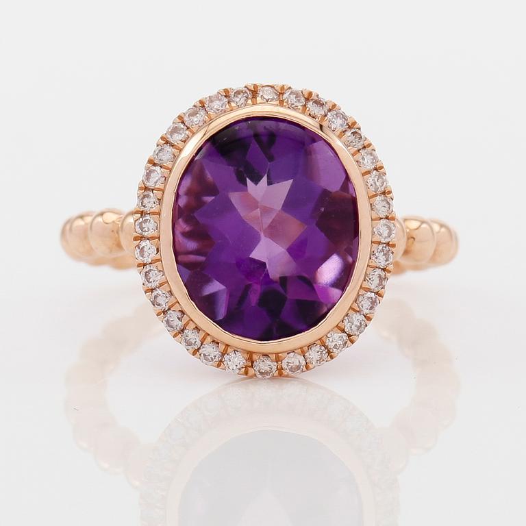 RING, 18K roséguld, diamanter tot ca 0.26 ct. och ametist.