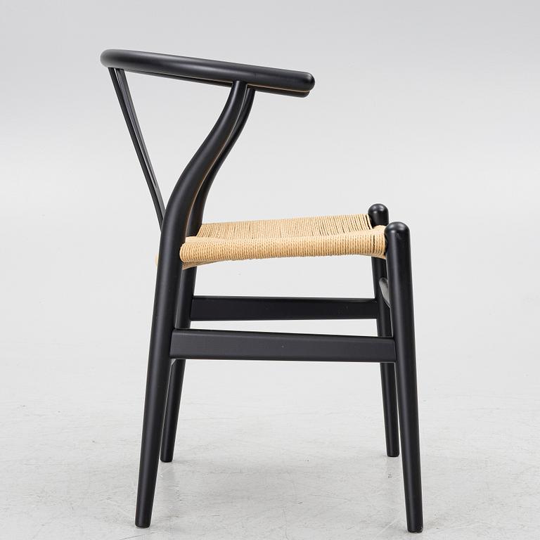 Hans J. Wegner, a model CH-24/'Wishbone' chair, Carl Hansen, Denmark, 21st century.