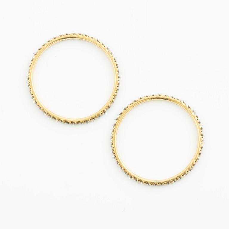 Ringar, Georg Jensen. ett par, "Signature", 18K guld med briljantslipade diamanter.