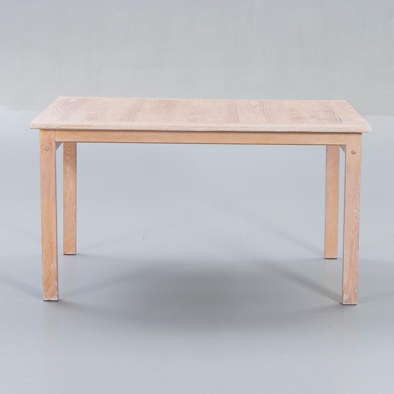 A Danish 1960s dining table and 6 chairs,
