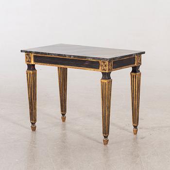 A mid 20th century Louis XVI-styel table from Paoletti, Firenze Italy.