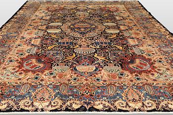 A Kashmar carpet, approx. 383 x 292 cm.