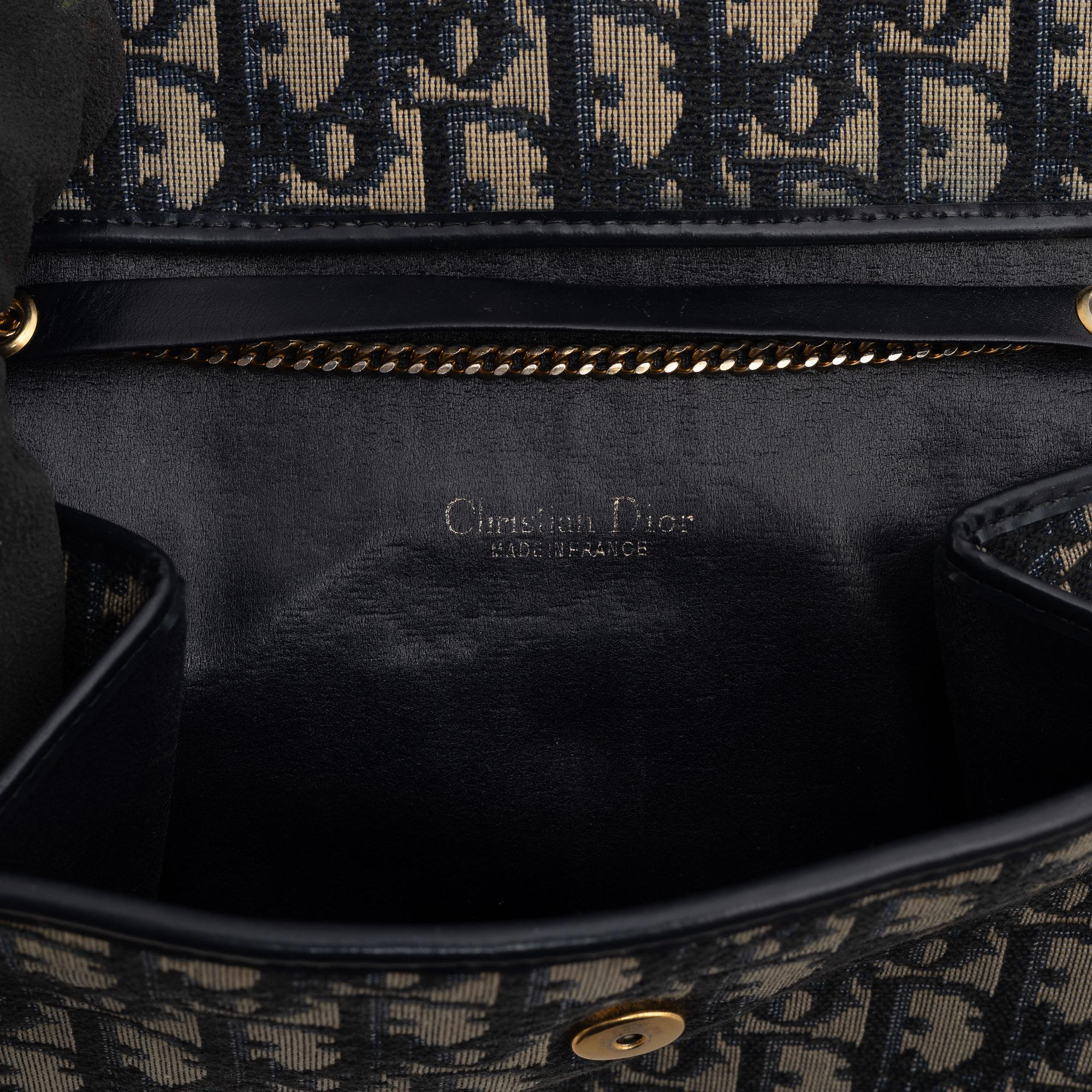 Christian Dior, a handbag/clutch.