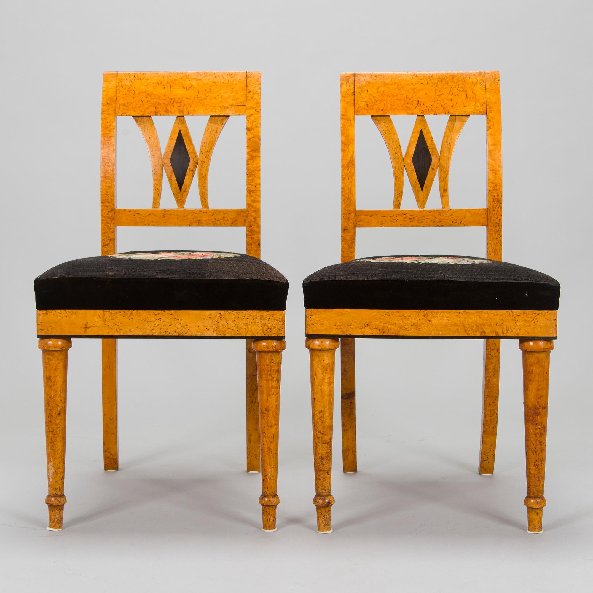 A pair of early-20th century chairs.