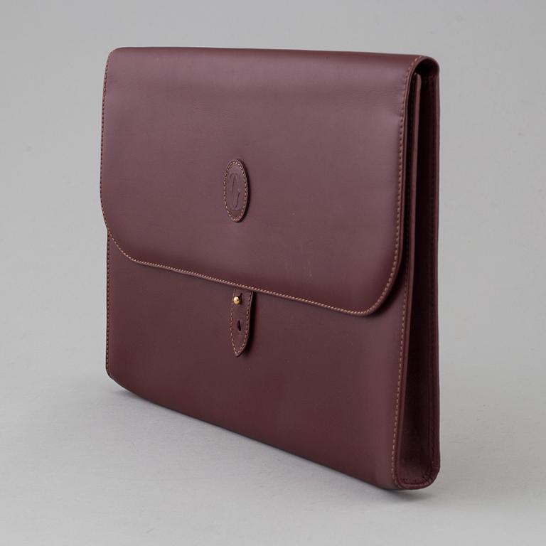 Wine-colored leather briefcase by Cartier.