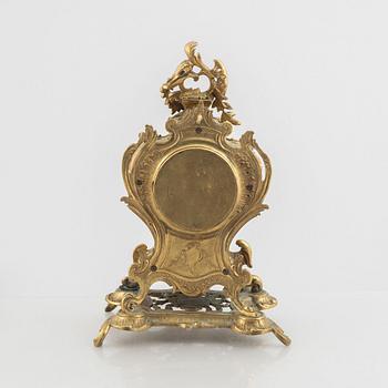 A Rococo Revival mantel clock, late 19th Century.