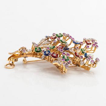 A 17K gold brooch/pendant with rose-cut diamonds, cabochon-cut rubies and enamel.