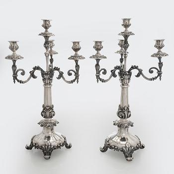 A pair of silver candelabra, maker marks of Carl Johan Tegelsten, Saint Petersburg 1850.