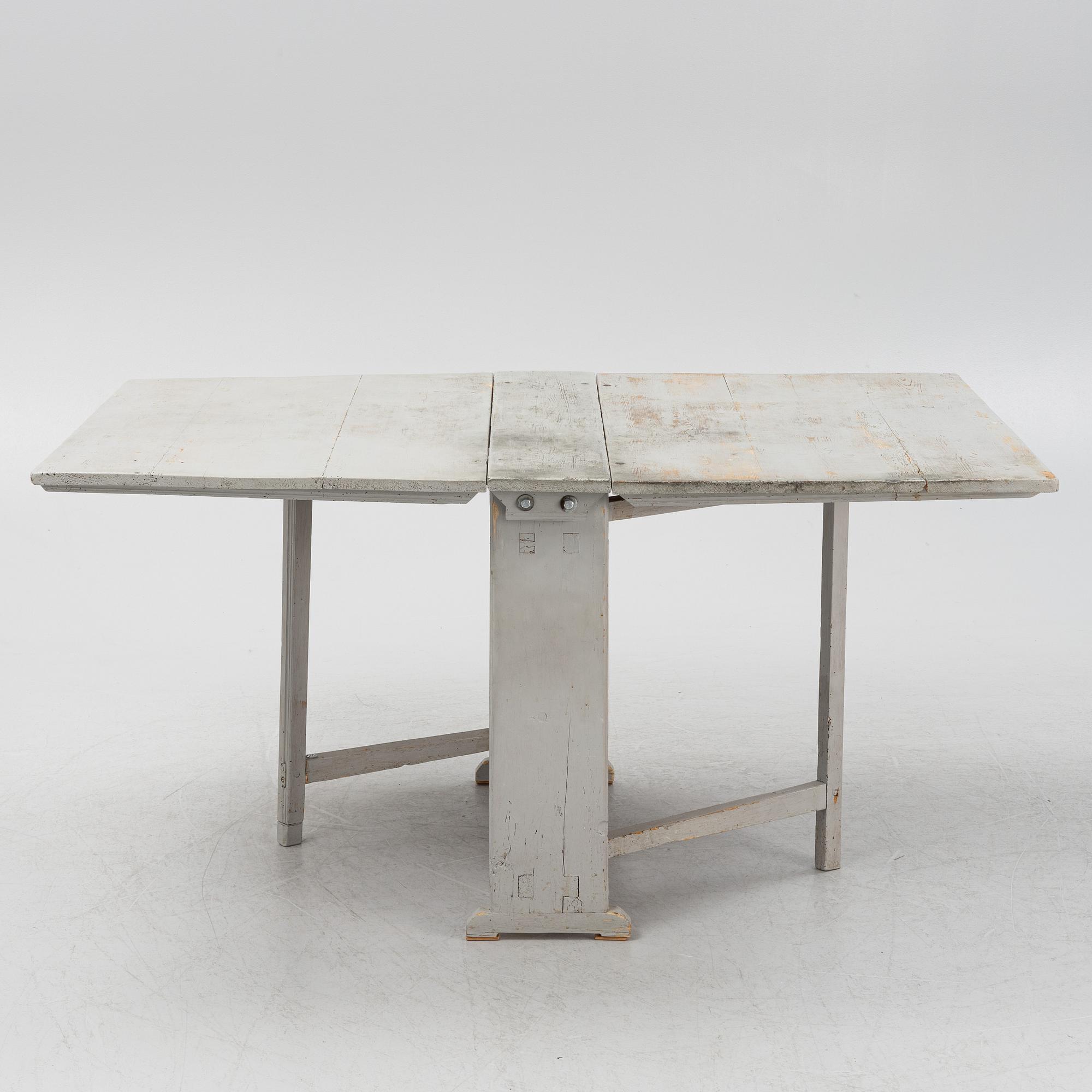 A 19th century gate-leg table.